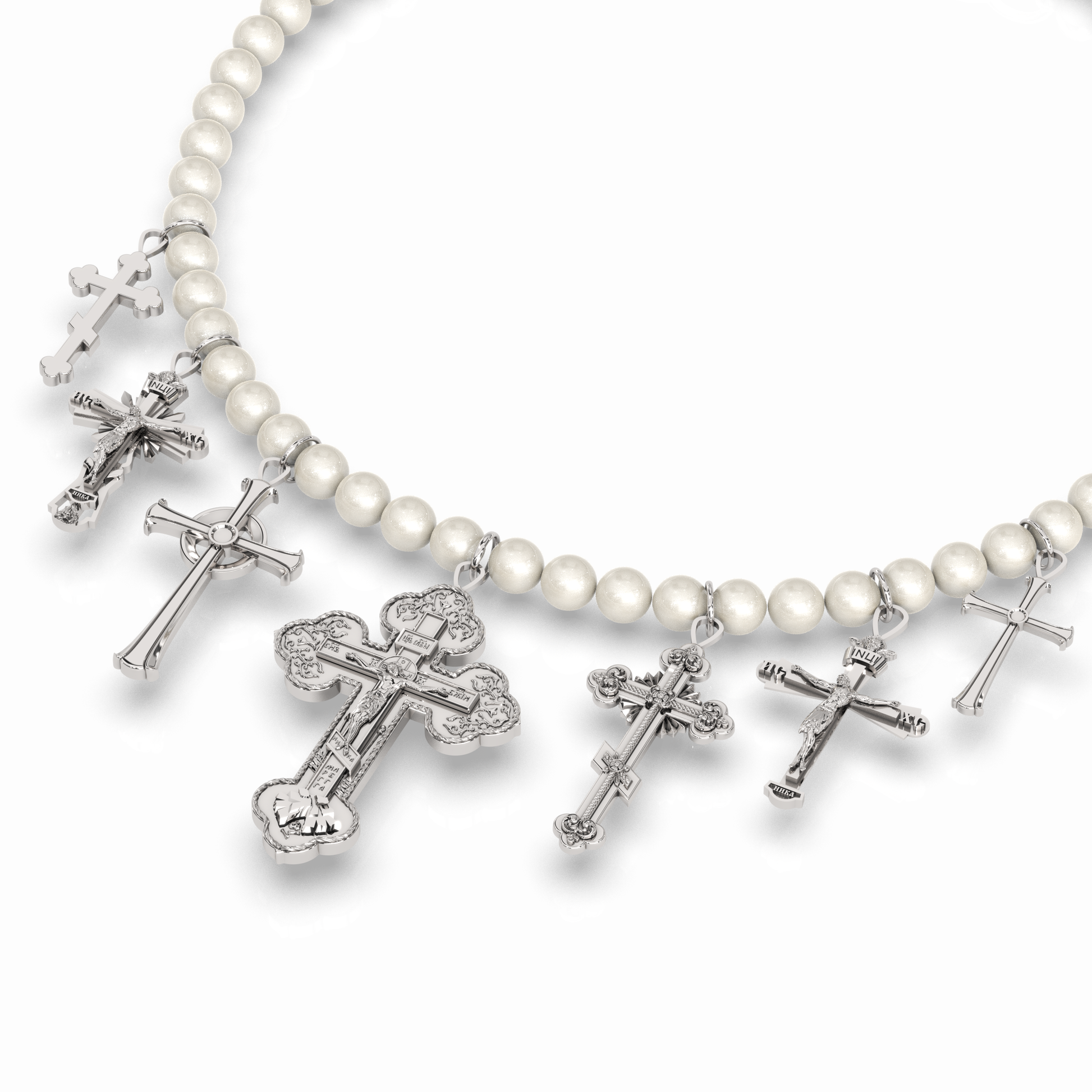 Elegant Mercy 2.0 necklace with 7 stainless steel crosses, synthetic pearls, and beads, showcasing refined craftsmanship and timeless elegance.